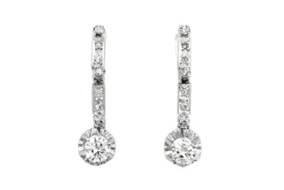 Lot 2080 - A Pair of Diamond Drop Earrings a row of...