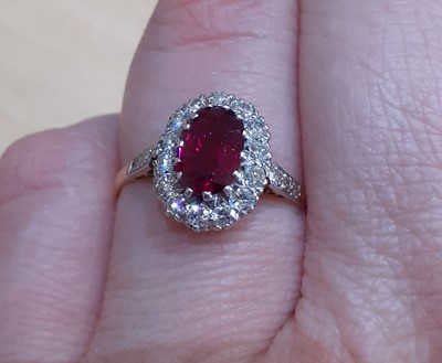 Lot 2036 - An 18 Carat Gold Synthetic Ruby and Diamond...