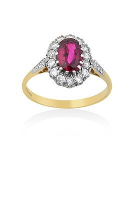 Lot 2036 - An 18 Carat Gold Synthetic Ruby and Diamond...
