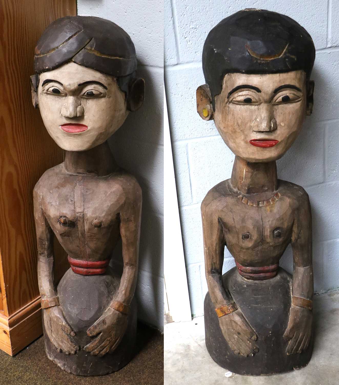 Lot 174 - A Pair of Javanese Polychrome Carved Wood...