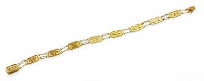 Lot 245 - A Fancy Link Bracelet, depicting hieroglyphics,...