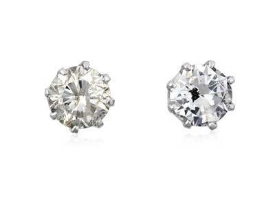 Lot 2211 - A Pair of Diamond Solitaire Earrings the round...