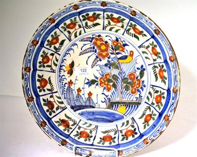 Lot 122 - A Dutch Delft Charger, circa 1730, painted in colours with a chinoiserie garden scene within a...