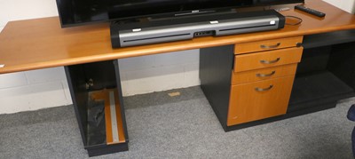 Lot 1119 - Neudorfler: A Cherrywood Curved Desk, on...