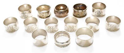Lot 104 - A collection of silver serviette rings