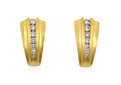 Lot 2081 - A Pair of 18 Carat Gold Diamond Earrings a row...