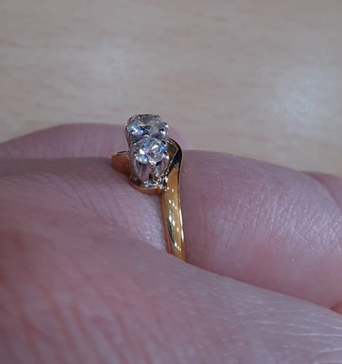 Lot 2156 - An 18 Carat Gold Diamond Three Stone Twist...