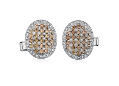 Lot 2239 - A Pair of Diamond Cufflinks the oval plaques...