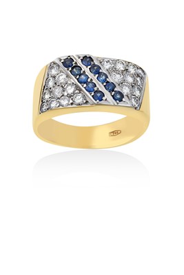 Lot 2020 - A Sapphire and Diamond Ring two rows of round...