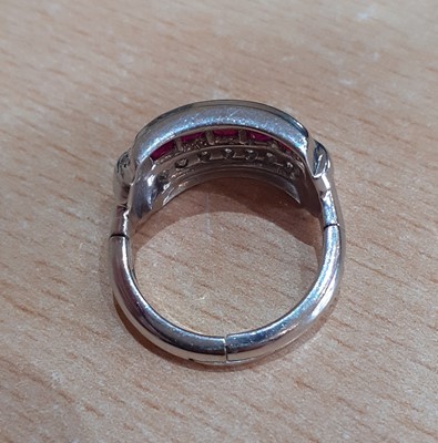 Lot 2059 - A Ruby and Diamond Ring five calibré cut...