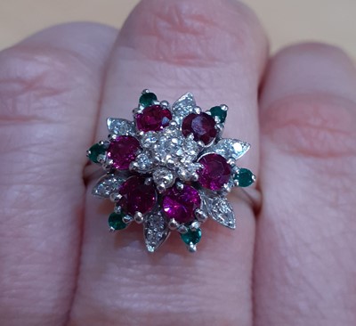 Lot 2030 - A Ruby, Emerald and Diamond Cluster Ring the...