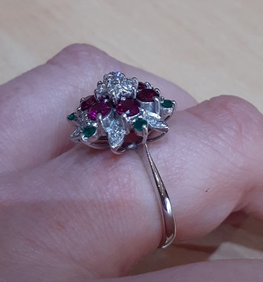 Lot 2030 - A Ruby, Emerald and Diamond Cluster Ring the...