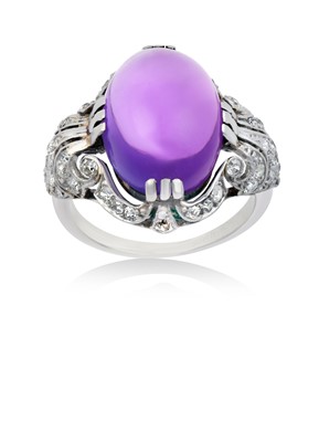 Lot 2214 - An Amethyst and Diamond Ring the oval cabochon...