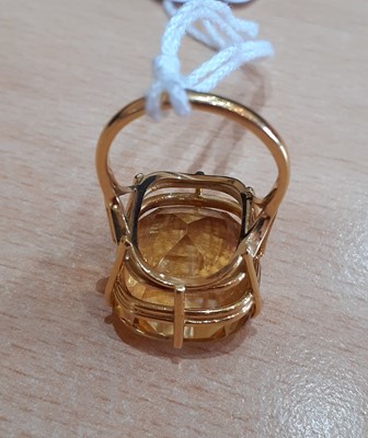 Lot 2042 - An 18 Carat Gold Citrine Solitaire Ring the...