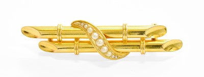 Lot 203 - A Split Pearl Brooch, two yellow rods overlaid...