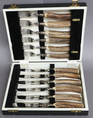 Lot 325 - A Cased Set of Fish Knives and Forks; a cased...