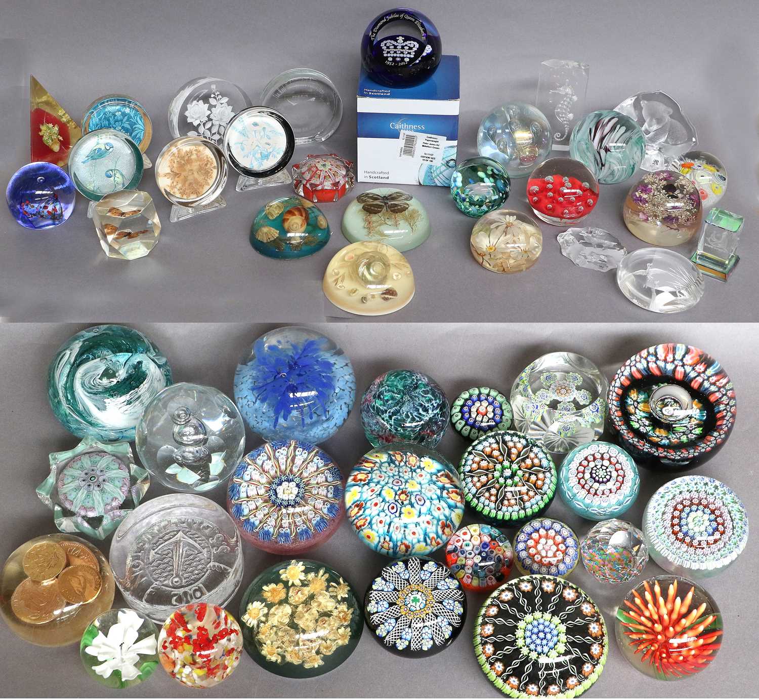 Lot 146 - A Selection of Glass Paperwieghts, including...