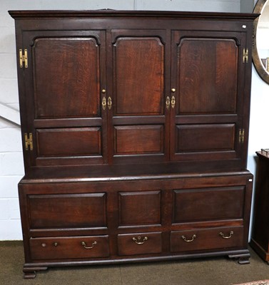 Lot 1161 - An 18th century Oak Livery Cupboard, 123cm by...