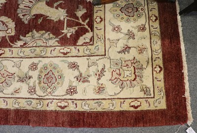 Lot 1022 - An Afghan Ziegler Carpet, the faded claret...