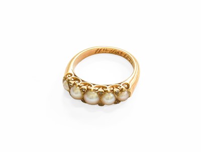 Lot 220 - A Split Pearl Five Stone Ring, with diamond...