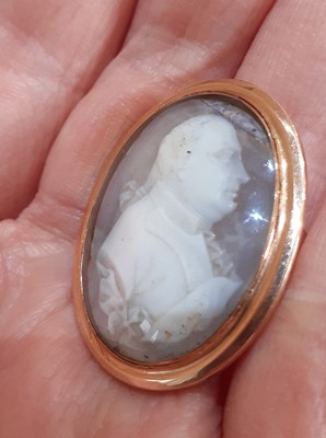 Lot 2123 - A Cameo Ring the glazed oval shell cameo...