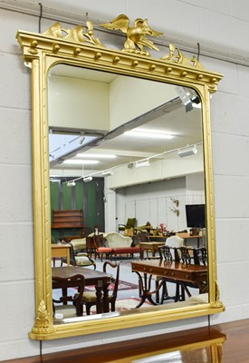 Lot 1125 - A Gilt Overmantel Mirror, the frame surmounted...