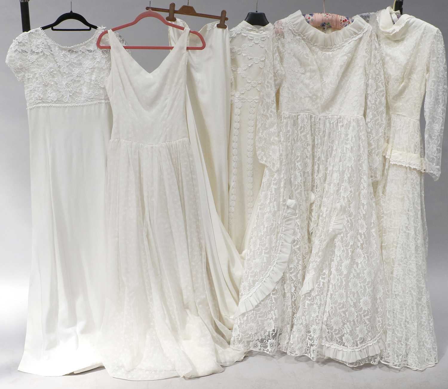 Lot 2039 - Circa 1950s and Later Wedding Dresses,...