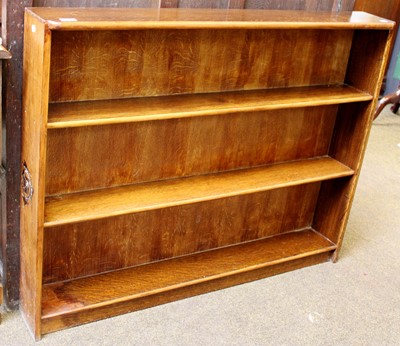 Lot 1217 - A 20th Century Oak Open Bookshelf, the side...