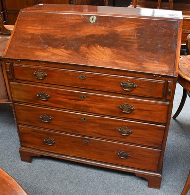 Lot 1283 - A George III Mahogany Bureau, with fitted...