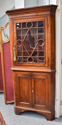 Lot 1299 - A George III Oak Standing Corner Cupboard,...