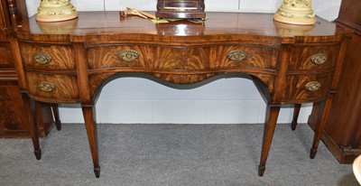 Lot 1189 - A George III Mahogany Serpentine Sideboard,...