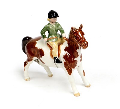 Lot 111 - Beswick Girl on Pony, model No. 1499, skewbald...