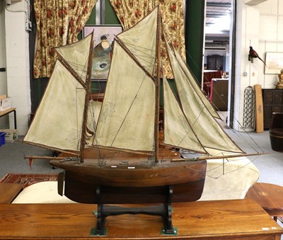 Lot 1111 - A Large Model Yacht on Stand, 147cm l by 132cm...