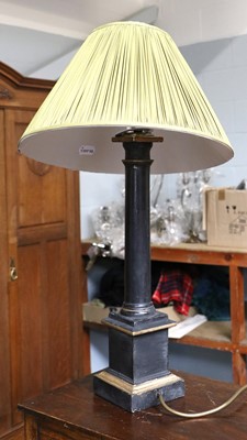 Lot 1304 - A Black Columnar Table Lamp, with green silk...