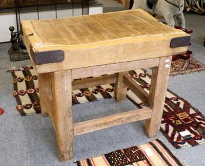 Lot 1085 - A 19th Century Hardwood Butchers Block, with...