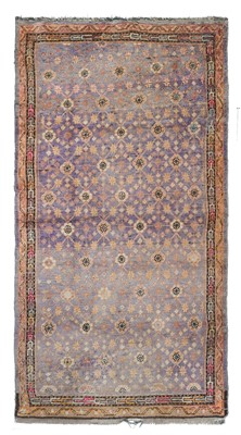 Lot 634 - Khotan Rug Sinkiang, circa 1920 The abrushed...