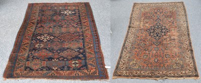 Lot 1107 - A Bidjar Rug, the indigo field with columns of...