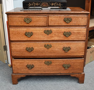 Lot 1222 - A George III Oak Straight Front Chest of...