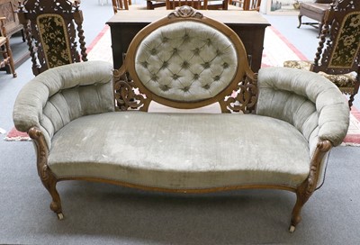 Lot 1162 - A Victorian Carved Walnut Settee, with scroll...