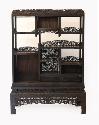 Lot 133 - A Chinese Carved Hardwood Display Cabinet,...