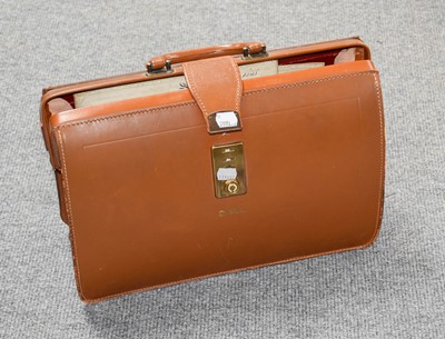 Lot 446 - A Leather Briefcase, containing A Quantity of...