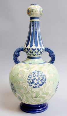 Lot 244 - A Burmantofts Faience Twin-Handled Bottle Vase,...