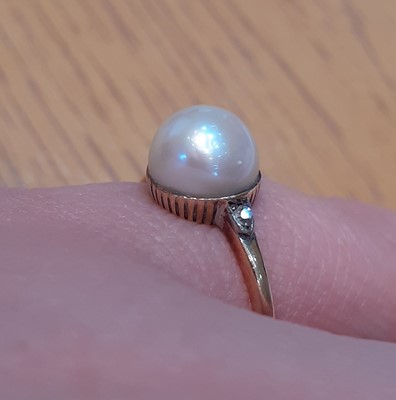 Lot 2110 - An Early 20th Century Pearl and Diamond Ring...