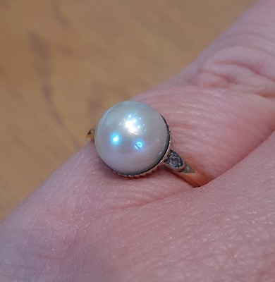 Lot 2110 - An Early 20th Century Pearl and Diamond Ring...