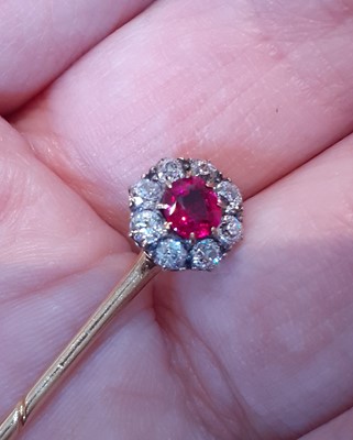 Lot 2173 - A Ruby and Diamond Cluster Stick Pin the...