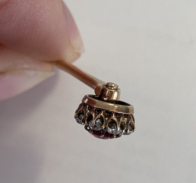 Lot 2173 - A Ruby and Diamond Cluster Stick Pin the...