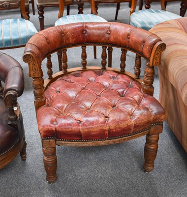 Lot 1211 - A Carved Oak Framed Studded Leather Club Chair