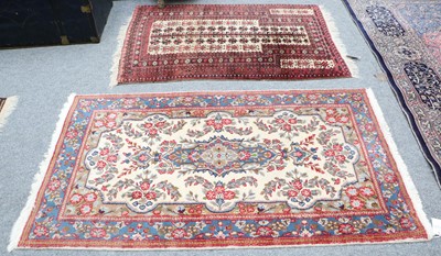 Lot 1034 - A Baluch Prayer Rug, the camel ground with the...