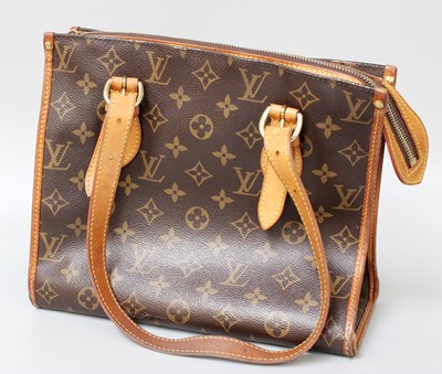 Lot 220 - A Louis Vuitton Shoulder Bag in LV monogrammed...