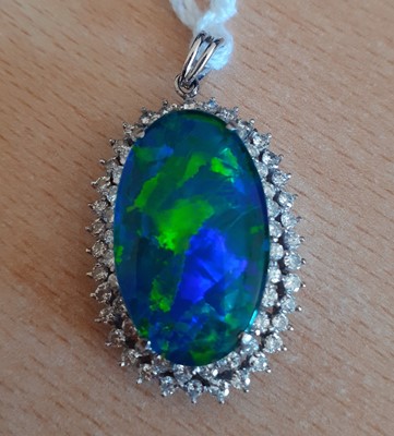 Lot 2010 - A Chinese Composite Opal and Diamond Pendant...
